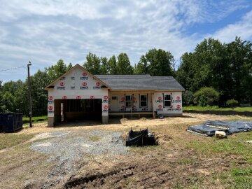 Sheathed home with attached garage nearing dry-in