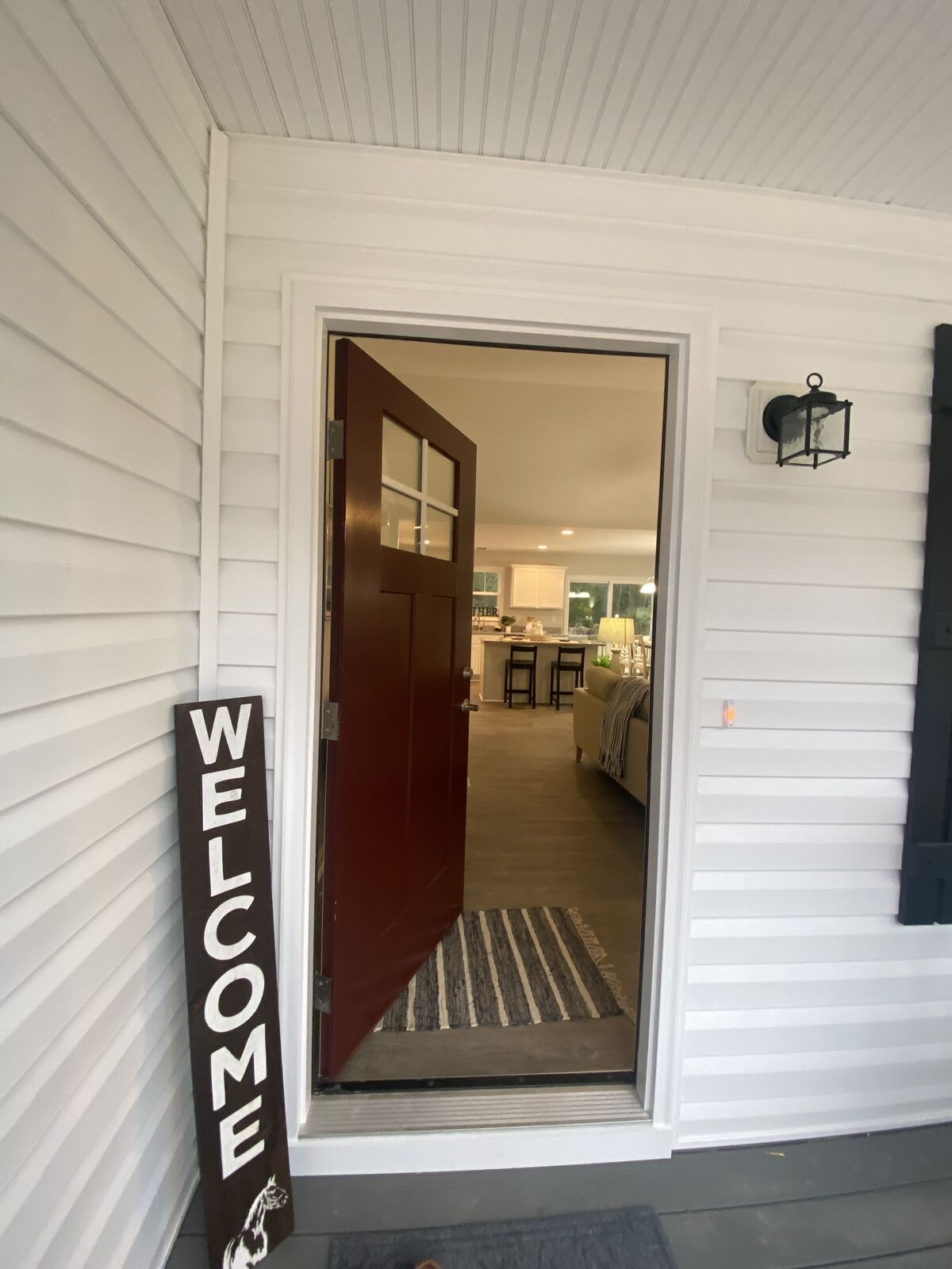 Welcoming front porch of a renovated B&R Property Solutions home